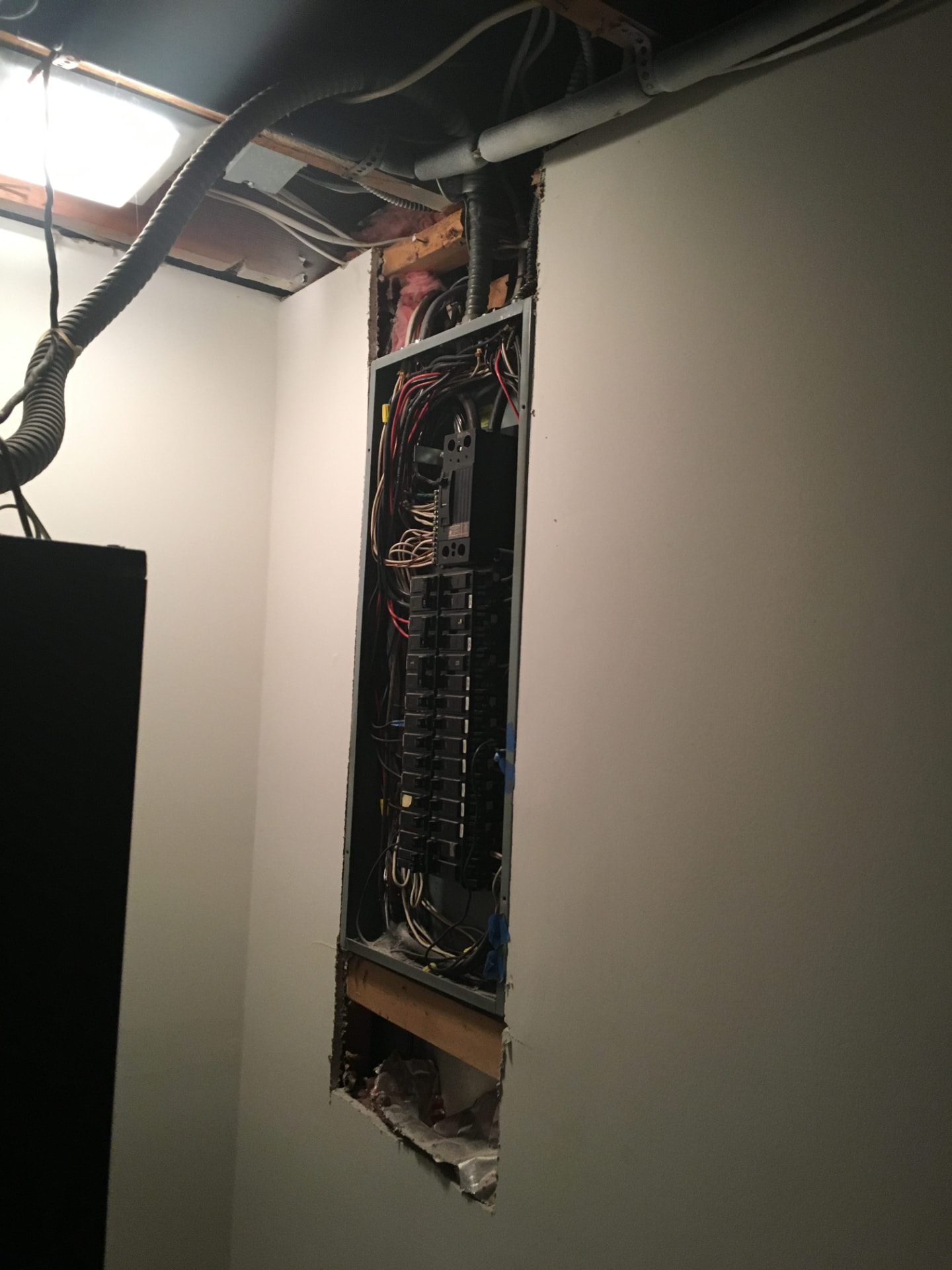 Electrical panel opened up for a breaker and service upgrade