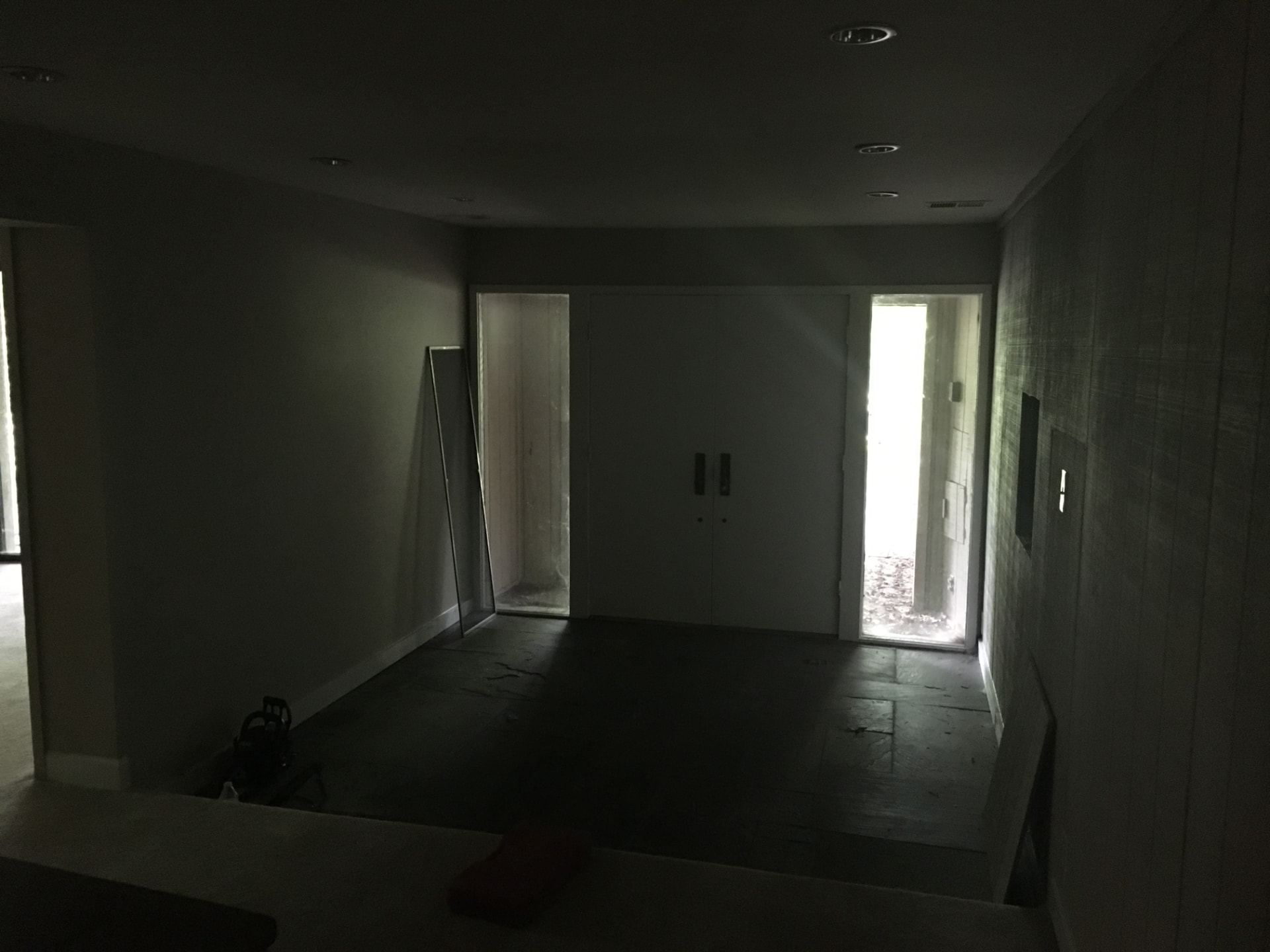 Recessed lighting installed throughout a finished interior